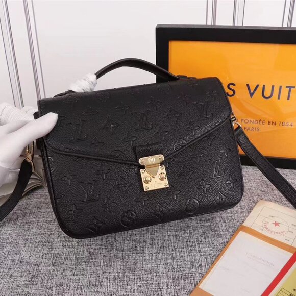 Louis Vuitton Handbags - Picture 1 of 9